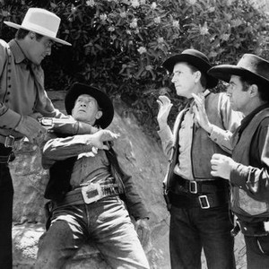 THE LONE RIDER IN FRONTIER FURY, from left: George Houston, Ted Adams (far right), 1941