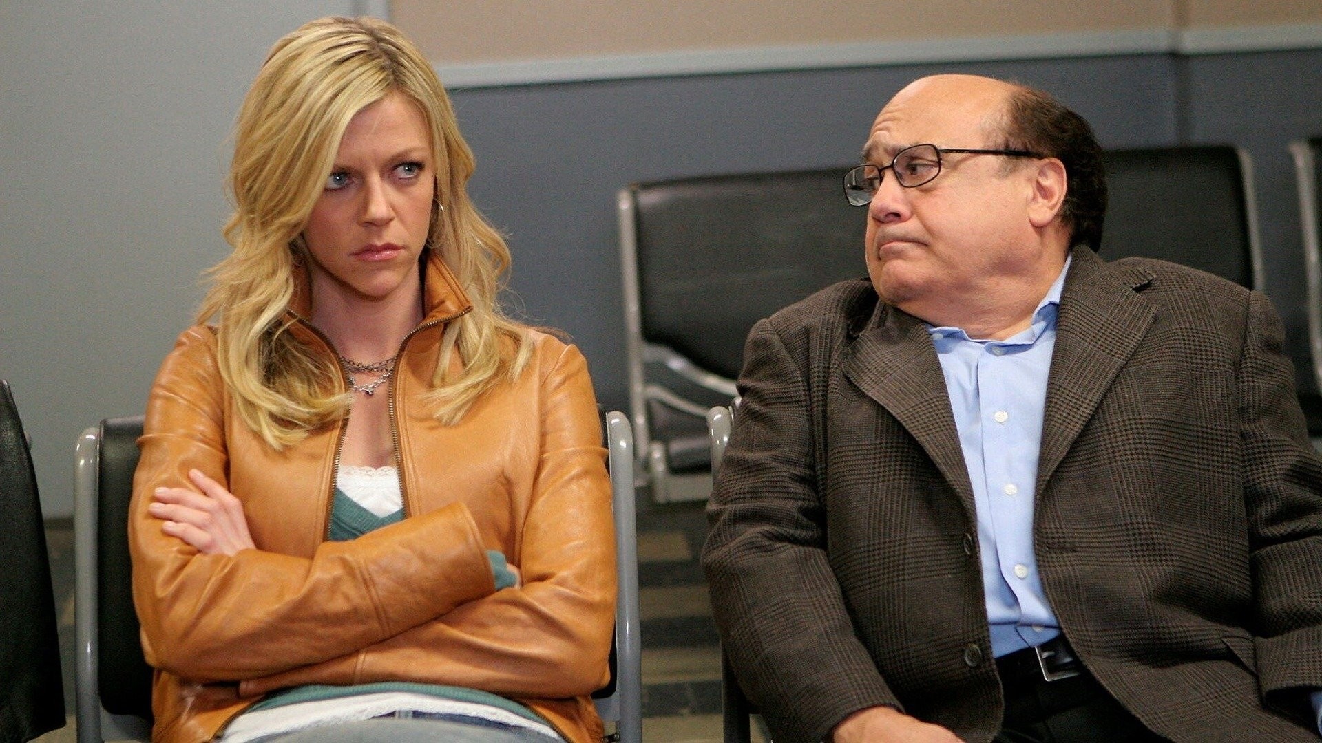 Season 2 episode still from It's Always Sunny in Philadelphia featuring Kaitlin Olson as Dee Reynolds and Danny DeVito as Frank Reynolds.