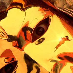 THE PROMISE, (aka WU JI), Cecilia Cheung (right) reflected in the mask worn by Jang Dong-Kun, 2005. ©Warner Independent Pictures