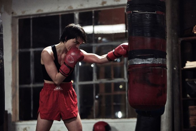 Toni Williams (Louise Grossmann) hits the heavy bag, in "Uppercut." (Lionsgate)