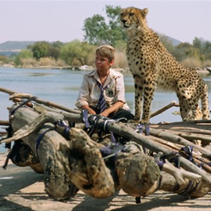 ALEX MICHAELETOS as Xan and his lovable cheetah Duma, in Warner Bros. photo 11