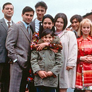 From left to right: Emil Marwa, Raji James, Chris Bisson, Archie Panjabi, Jordan Routledge (front), Ruth Jones, Jimi Mistry and Emma Rydal in Miramax's East Is East