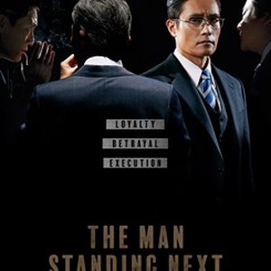 The Man Standing Next photo 16
