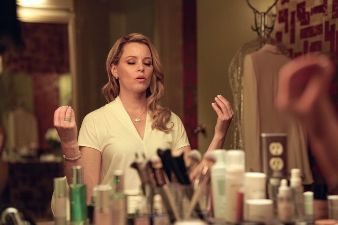 Hope Goldman (Elizabeth Banks) prepares for an interview, in "Skincare." (IFC Films)