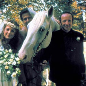 Bride, Marilyn (Debra Winger) and groom, Leon Barlow (Arliss Howard) with (center) best man Monroe (Paul Le Mat) and Mr. Ed in BIG BAD LOVE. An IFC Films release. photo 17