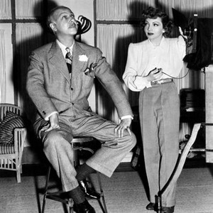 NO TIME FOR LOVE, director Mitchell Leisen, Claudette Colbert fooling around on set, 1943