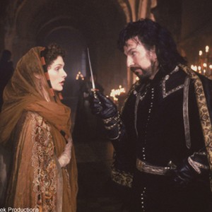 Mary Elizabeth Mastrantonio as Marian and Alan Rickman as the Sheriff of Nottingham. photo 3