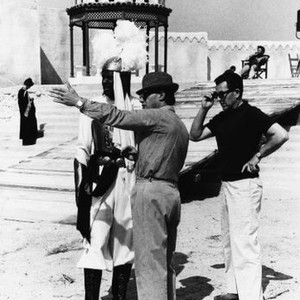 THE LONG SHIPS, Sidney Poitier (helmet), director Jack Cardiff (arm outstretched) on set, 1964