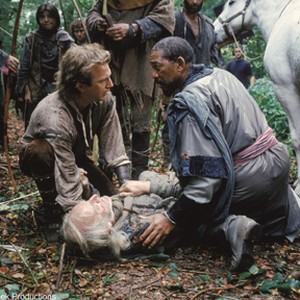Kevin Costner as Robin of Locksley, Morgan Freeman as Azeem, and Walter Sparrow as Duncan (on ground). photo 5