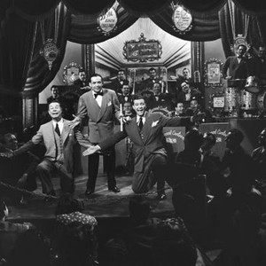 HOLLYWOOD CANTEEN, front from left: Joe E. Brown, Jimmy Dorsey, Dennis Morgan, Jimmy dorsey Orchestra (rear), 1944