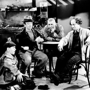 MEET THE BARON, from left: Moe Howard, Ted Healy, Curly Howard, Larry Fine, 1933
