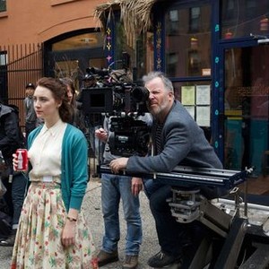 BROOKLYN, front, from left: Saoirse Ronan, cinematographer Yves Belanger, on set, 2015. ph: Kerry Brown/TM and ©Copyright Fox Searchlight Pictures. All rights reserved.