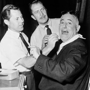 THE TINGLER, Vincent Price (center) watches horrified director William Castle (right) being made up in gag shot on set, 1959, tingl_stl_26_h, Photo by:  (tingl_stl_26_h.jpg), Photo by:  (tingl_stl_26_h.jpg)