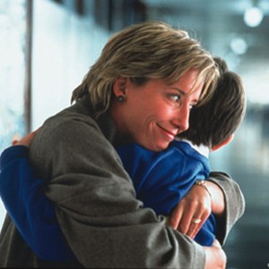 Karen (EMMA THOMPSON) and son Bernie (WILLIAM WADHAM) embrace in Richard Curtis' romantic comedy Love Actually. photo 14