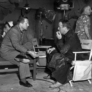 THE LEFT HAND OF GOD, director Edward Dmytryk, Humphrey Bogart, on-set, 1955, TM and Copyright (c) 20th Century Fox Film Corp. All rights reserved.
