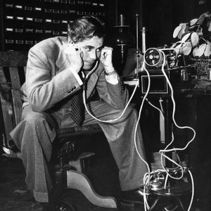 THE ADVENTURES OF MARTIN EDEN, Glenn Ford, listening to a recording of source author Jack London's voice, 1942