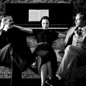 W.E., Andrea Riseborough as Wallis Simpson (center), James D'Arcy as King Edward VII (right), 2011. ©Weinstein Company