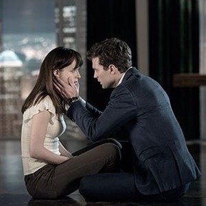 Dakota Johnson as Anastasia Steele and Jamie Dornan as Christian Grey in "Fifty Shades of Grey."