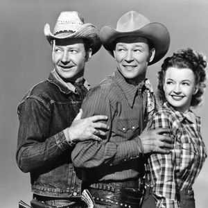DOWN DAKOTA WAY, from left: Pat Brady, Roy Rogers, Dale Evans, 1949