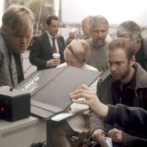 ALONG CAME POLLY, Philip Seymour Hoffman (far left), Ben Stiller (background, wearing suit), director John Hamburg (second from right), on set, 2004. ©Universal