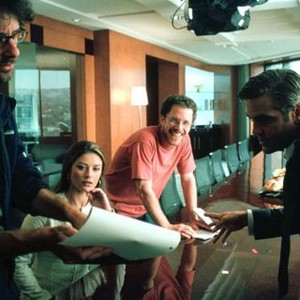 INTOLERABLE CRUELTY,  Director Joel Coen, Catherine Zeta-Jones, screenwriter Ethan Coen, George Clooney on the set, 2003, (c) Universal
