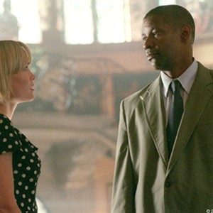  Radha Mitchell and Denzel Washington have a frank discussion about the dangers facing her family. photo 19