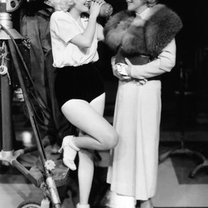 HOLD YOUR MAN, from left: Jean Harlow with visitor Gladys George on set, 1933