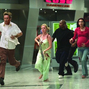 L to r) Michael (JAKE WEBER), Ana (SARAH POLLEY), Andre (MEKHI PHIFER) and Luda (INNA KOROBKINA) charge to head off a zombie break-in in the zombie action thriller, Dawn of the Dead. photo 8