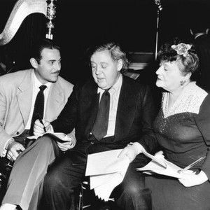 THE TUTTLES OF TAHITI, from left: Jon Hall, Charles Laughton, Florence Bates consult their scripts, 1942