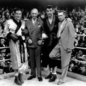 THE PRIZEFIGHTER AND THE LADY, Max Baer (left), Primo Carnera (second from right), director W.S. Van Dyke (right) on set, 1933