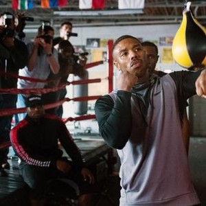 CREED II, COREY CAILLET (SEATED), MICHAEL B. JORDAN, WOOD HARRIS (PARTIALLY VISIBLE), 2018. PH: BARRY WETCHER/© MGM