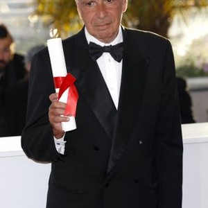 producer alain sarde poses with the jury prize awarded to director jean-luc godard who was absent during the photocall with the awards winner at the 67th cannes film festival on may 24, 2014 (48873432) ©dpa
