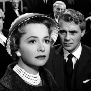 LIBEL, from left: Robert Morley, Olivia de Havilland, Dirk Bogarde, 1959