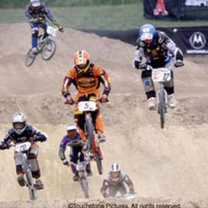 Justin Loffredo (center, #5) leads the pack (clockwise from left: Alan Foster, #20; John Purse, #15; Neal Wood, #12; Brian Strieby/Steve Veltman, #6) as the men compete in the downhill BMX race. photo 15