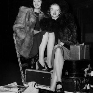 From left, Virginia Cruzon, Myrna Dell, on a countrywide train tour to promote ZIEGFELD GIRL, April 1941