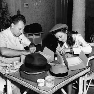 YOU BELONG TO ME, from left, director Wesley Ruggles, Barbara Stanwyck, on their lunch break, 1941