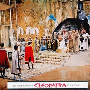 CLEOPATRA, Richard Burton as Antony (standing right on carpet), at top of stair front from left: Hume Cronyn, Elizabeth Taylor as Cleopatra (on throne), Cesare Danova, 1963, TM & Copyright © 20th Century Fox Film Corp.