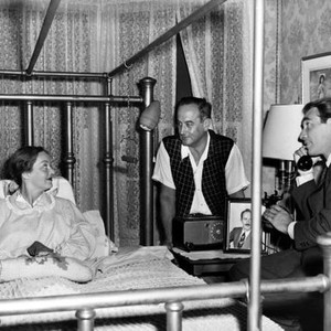 PHONE CALL FROM A STRANGER, Bette Davis takes direction from Jean Negulesco, with Gary Merrill looking on, 1952