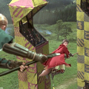 Harry Potter (DANIEL RADCLIFFE, right) and Draco Malfoy (TOM FELTON) on the Quidditch field in Warner Bros. Pictures' "Harry Potter and the Chamber of Secrets."