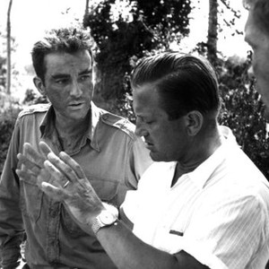 THE YOUNG LIONS, Montgomery Clift and director Edward Dmytryk on the set, 1958, TM & Copyright (c) 20th Century Fox Film Corp.  All rights reserved.