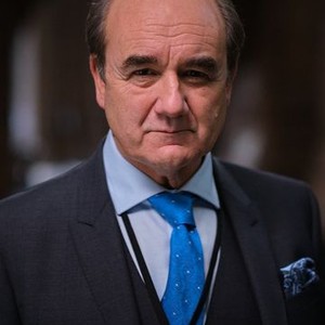 David Haig as Home Secretary Archie Glover