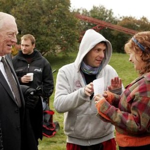 EMOTIONAL ARITHMETIC, foreground starting second from left: Max von Sydow, director Paolo Barzman, Susan Sarandon, on set, 2007. ©Celluloid Dreams