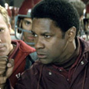 When Herman Boone (winner Denzel Washington, center) is hired over veteran football coach Bill Yoast (Will Patton, left) to lead the Titans, the players are forced to overcome obstacles.