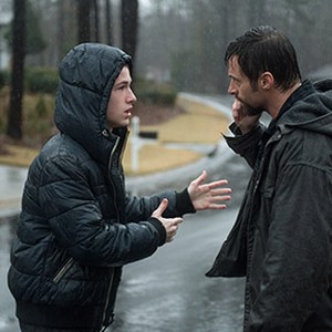 (L-R) Dylan Minnette as Ralph Dover and Hugh Jackman as Keller Dover in "Prisoners." photo 13