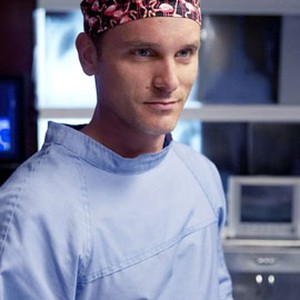 Chris William Martin as Dr. Simon Griffith