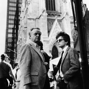 BRIGHT LIGHTS, BIG CITY, from left, director James Bridges, Michael J. Fox, on location in New York, 1988, ©United Artists