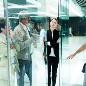 TRANSCENDENCE, Cillian Murphy (left), Morgan Freeman (left of center), Rebecca Hall (in black), director Wally Pfister (right), on set, 2014. ph: Peter Mountain/©Warner Bros. Pictures