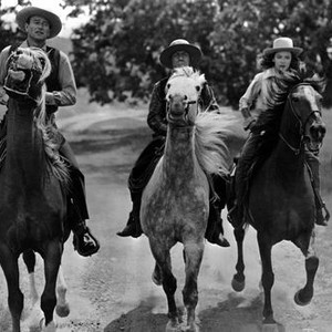 TALL IN THE SADDLE, John Wayne, Frak Puglia, Ella Raines, 1944