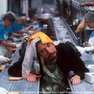Gord (TOM GREEN) tries to break the monotony of his new job in a cheese sandwich factory. photo 4