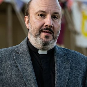 Paul Chahidi as Reverend Francis Seaton